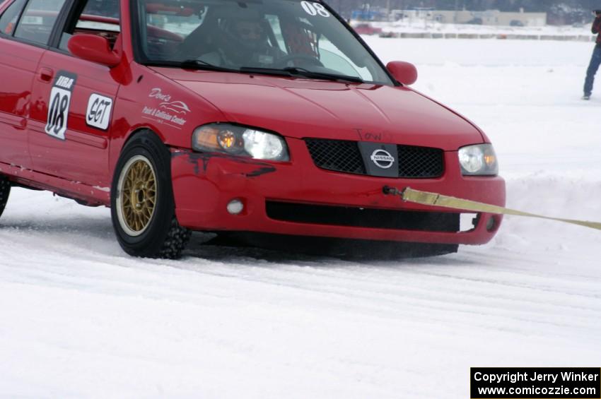 Pete Tavernier / Bruce Powell Nissan Sentra Spec V lost a wheel on the back part of the track