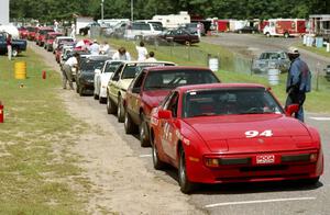 Jim Bryant's ITS Porsche 944, Stu Lenz' SSGT Ford Mustang, Harvey West's Ford Mustang, etc on the false grid.