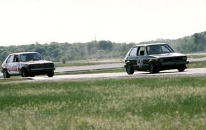 46) Kurt Ristow's ITA VW GTI and 83) Mark Utecht's ITB Dodge Omni