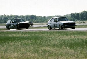 83) Mark Utecht's ITB Dodge Omni and 46) Kurt Ristow's ITA VW GTI