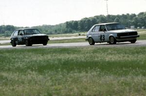 83) Mark Utecht's ITB Dodge Omni and 46) Kurt Ristow's ITA VW GTI