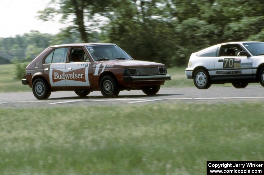 17) Bill Nelson's ITB Plymouth Horizon and 70) Lynn Anderson's SSC Honda CRX