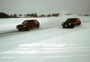 The Dave Kapaun / Len Jackson VW Rabbit battles the Jonathan Schmelz / Steve Bohner VW Golf.