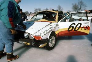 The John Kochevar / Bruce Rosand VW Scirocco after rolling at the end of the front straight.