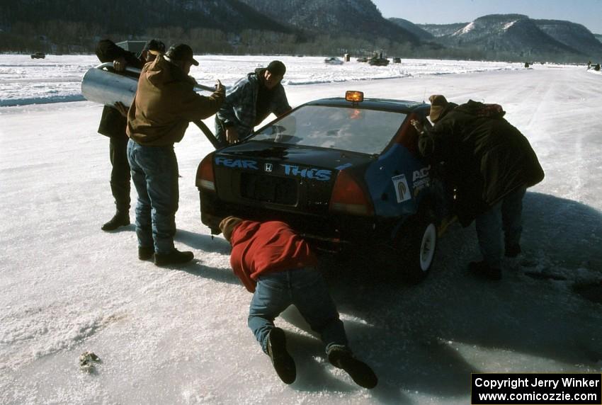 The Cory Coulson / Dave Slaback Honda Prelude comes in for fuel.