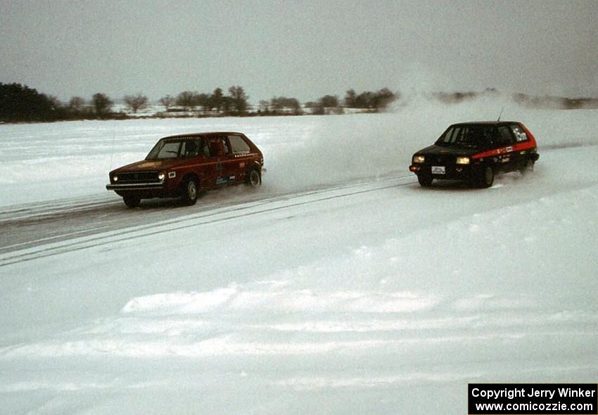 The Dave Kapaun / Len Jackson VW Rabbit battles the Jonathan Schmelz / Steve Bohner VW Golf.