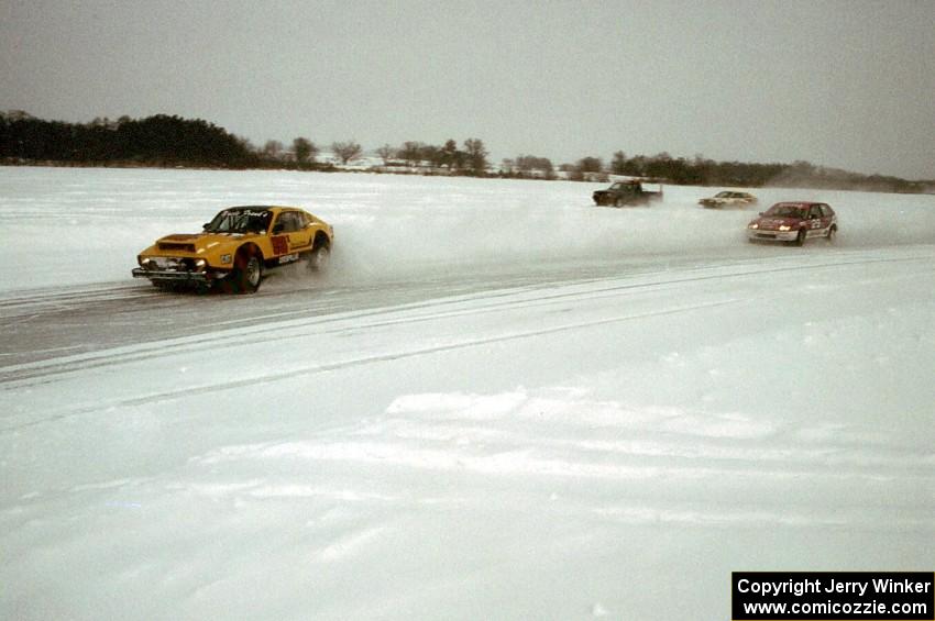 Hunter Jones / Ed Fukushima SAAB Sonnet III is chased by the Scott Kronn / Steve Noffke Honda Civic GSR early on.