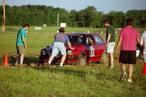 Brenda Corneliusen, in J.B. Niday's VW GTI, gets pushed out by Stu Lenz, Tim Winker and Paul Richardson.