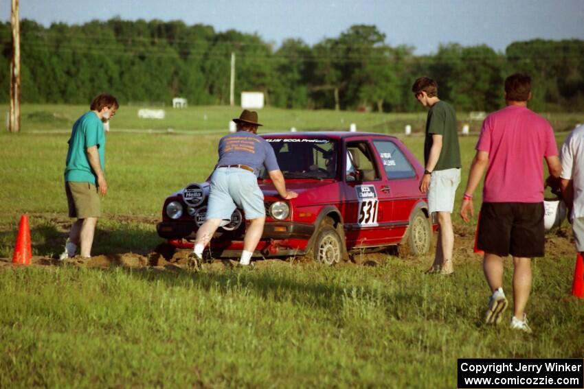 Brenda Corneliusen, in J.B. Niday's VW GTI, gets pushed out by Stu Lenz, Tim Winker and Paul Richardson.