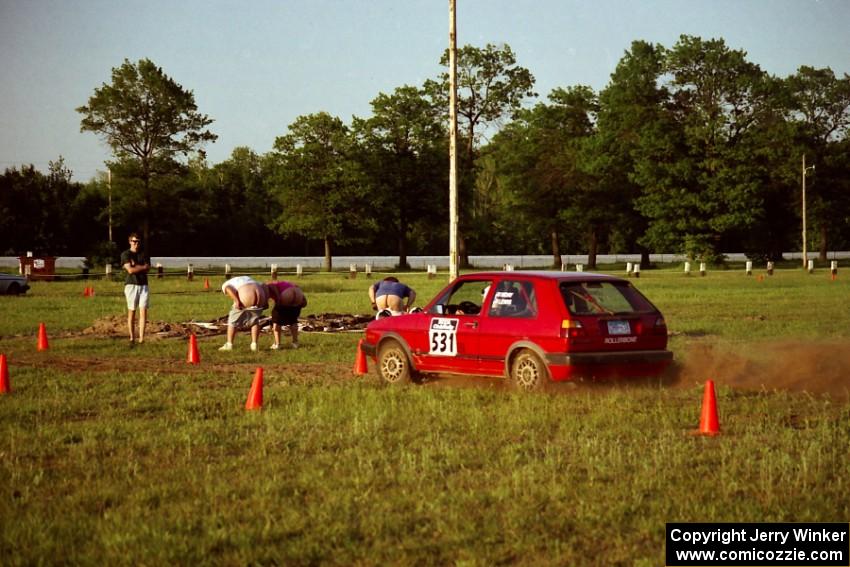 Brenda Corneliusen, in J.B. Niday's VW GTI, gets an eyeful the next time through