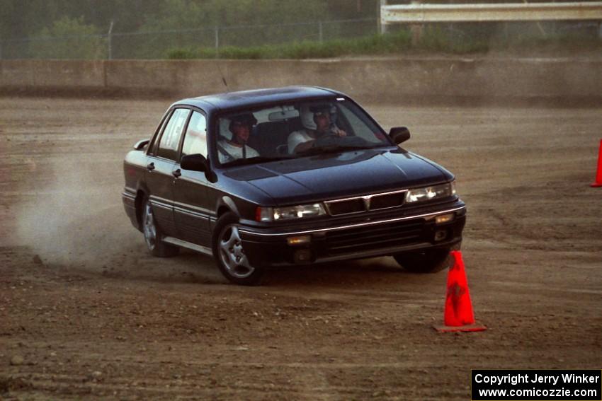 Eric Carlson's Mitsubishi Galant GSX with Mark Utecht as his passenger