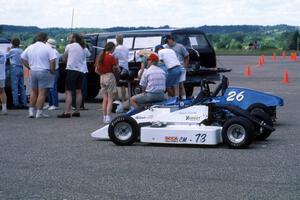 Mike Langstaff's (73) and Mike Skillingstad's (26) Red Devils parked near the scoring area