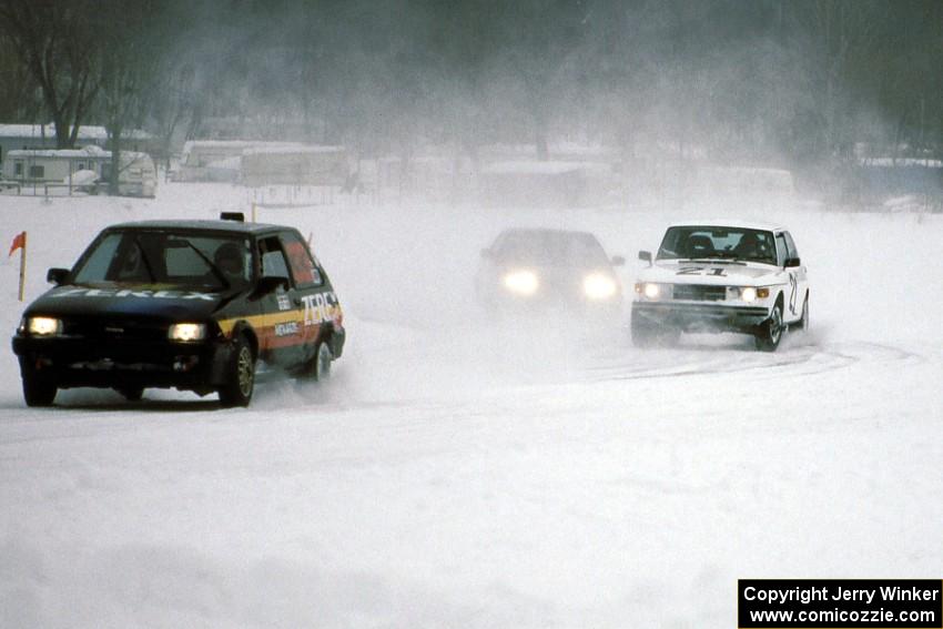 Chris Menard / Charlie Menard Toyota FX-16, Dan Burhans / Tammy Burhans SAAB 99 and Todd Freeman / ??? Honda CRX Si