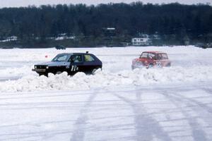 Paul Gilbert / Gary Rentfro VW Rabbit trailed by Jim Julson's modified Austin Cooper S