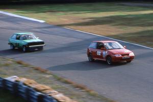 Mike Brown's ITB Suzuki Swift GTI and Glen Wilson's ITC Ford Fiesta