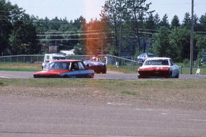 96) Scotty Bell's GT3 Datsun 510 ahead of 41) ???'s GT3 Chevy Corvair and 72) Mike Froh's E Production MGB