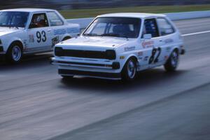 Tom Schabel's ITC Ford Fiesta alongside Mark Stohm's ITB Toyota Corolla