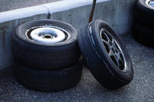 A tire down to the cords off Mike Brown's ITB Suzuki Swift GTI