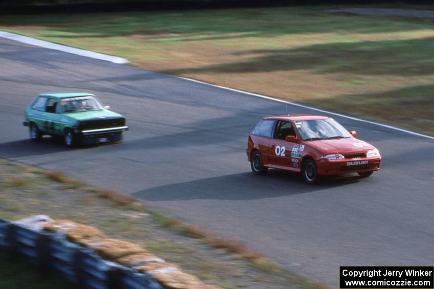 Mike Brown's ITB Suzuki Swift GTI and Glen Wilson's ITC Ford Fiesta