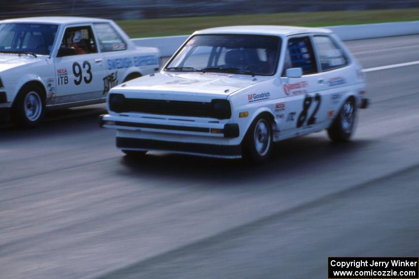 Tom Schabel's ITC Ford Fiesta alongside Mark Stohm's ITB Toyota Corolla