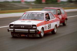 Bruce Parsons' ITC Datsun 210 and Bob Malterer's ITB VW Golf