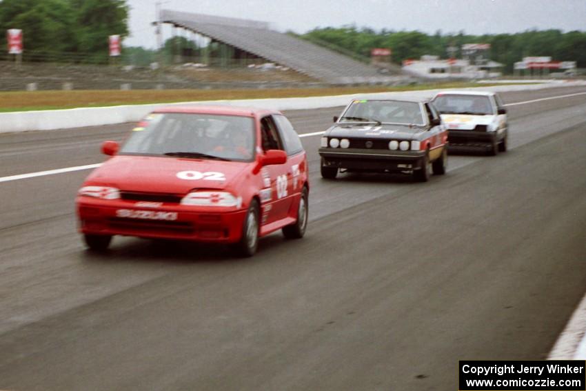 Mike Brown's ITB Suzuki Swift GTI, Bryan LaPlante's ITB VW Sciriocco and Fritz Wilke's ITC Honda Civic