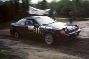 Vinnie Frontinan / Frank Arruda press on at speed minus a rear tire on their Toyota Celica All-Trac.