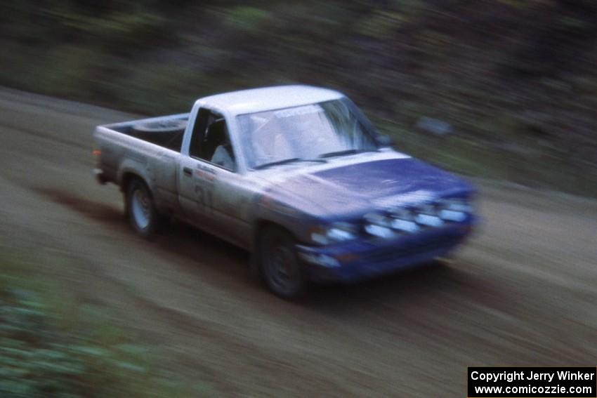 Mark Alderson / Bill Boggs prepare for a left-hander in their Toyota Pickup. Note the sandy braking area.