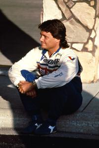 Subaru factory driver Chad DiMarco takes a break on the front step of the Northern Inn.