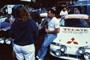 Mexican rally driver Antonio Menendez is interviewed in front of the Mitsubishi Eclipse he shared with Juan Goya.(1)