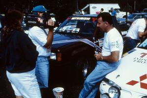 Mexican rally driver Antonio Menendez is interviewed in front of the Mitsubishi Eclipse he shared with Juan Goya.(2)