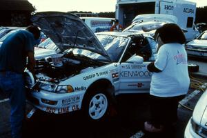 The Peter Cunningham / Joe Andreini Acura Integra gets checked out by a local radio station mascot at parc expose.