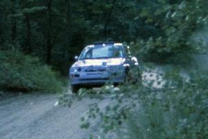 Carl Merrill / J. Jon Wickens Ford Escort Cosworth RS takes it easy at the Two Inlets yump.