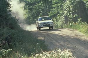 The Tony Takaori / Ken Cassidy Mitusbishi Galant VR4 catches a little air at the jump on Indian Creek Forest Rd.