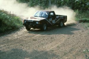 The Gary Gooch / Judi Gooch Mitsubishi Pickup at the 90-right on Indian Creek Forest Rd.