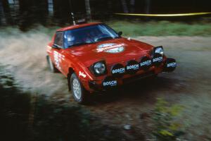 The Bruce Newey / Kennon Rymer Mazda RX-7 at the 90-right on Indian Creek Forest Rd.