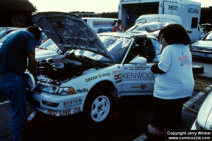 The Peter Cunningham / Joe Andreini Acura Integra gets checked out by a local radio station mascot at parc expose.