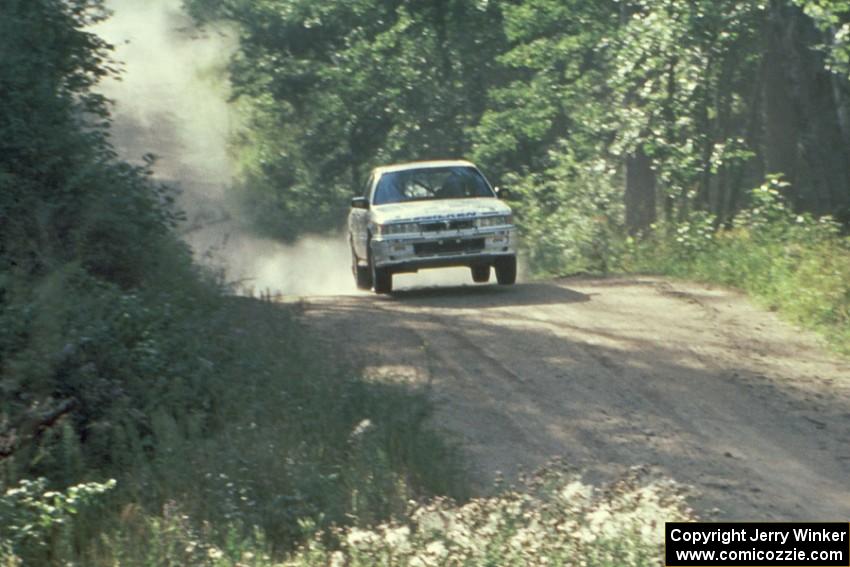 The Tony Takaori / Ken Cassidy Mitusbishi Galant VR4 catches a little air at the jump on Indian Creek Forest Rd.