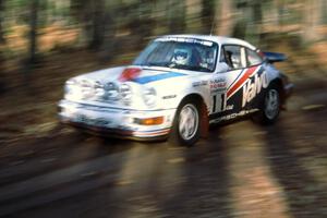 The Jeff Zwart / David Stone Porsche Carrera 4 finishes SS1.