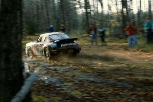 Jeff Zwart / David Stone Porsche Carrera 4 perfectly reflected in a mud puddle.