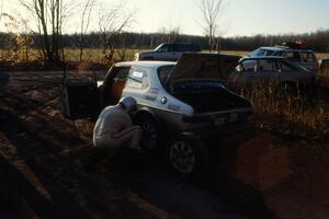 Tom Gillespie / Bill Smith DNF'ed in their SAAB 99 seen here changing a tire.