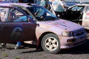 Carl Merrill / Jon Wickens in the Ford Escort Cosworth RS RS receives service on day two.