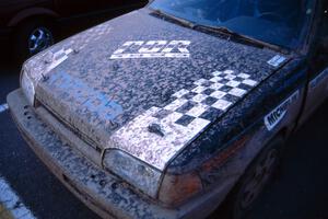 Steve Gingras / Bill Westrick muddy Mazda 323GTX after the finish.