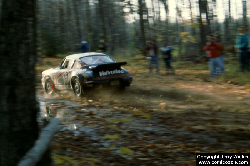 Jeff Zwart / David Stone Porsche Carrera 4 perfectly reflected in a mud puddle.