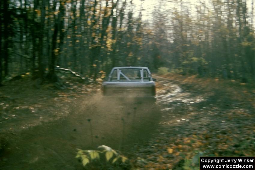 Guy Light / Dave White sling mud at spectators in their GMC Sonoma.