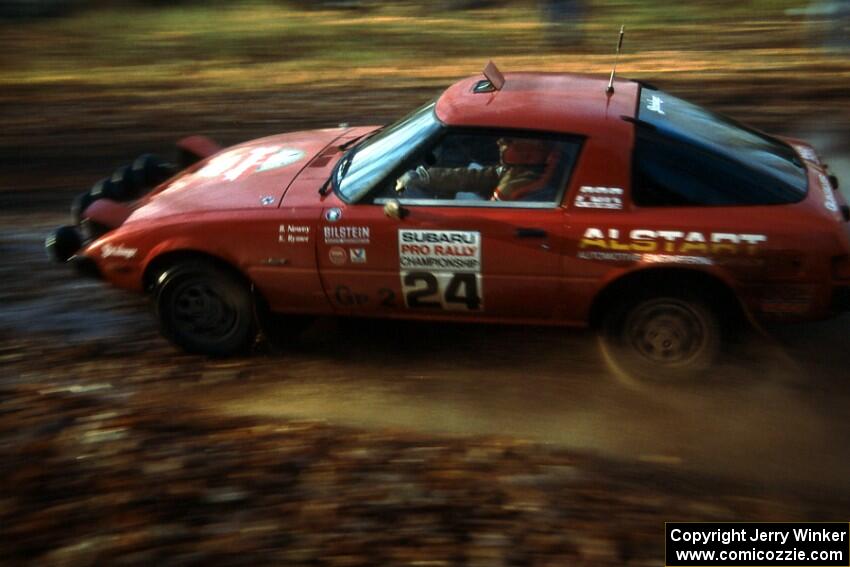 Bruce Newey / Kennon Rymer hit the slippery stuff in their Mazda RX-7.