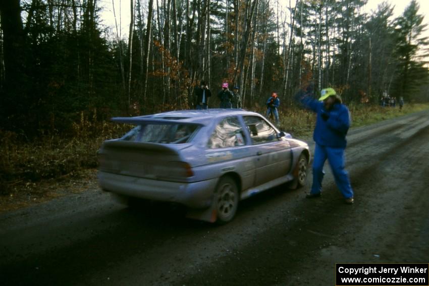 Charlie Cotterman starts Carl Merrill / Jon Wickens in the Ford Escort Cosworth RS.