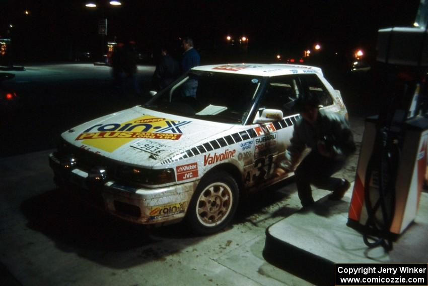 Makio Yamanaka / John McArthur Mazda 323GTX gets gas in L'Anse.