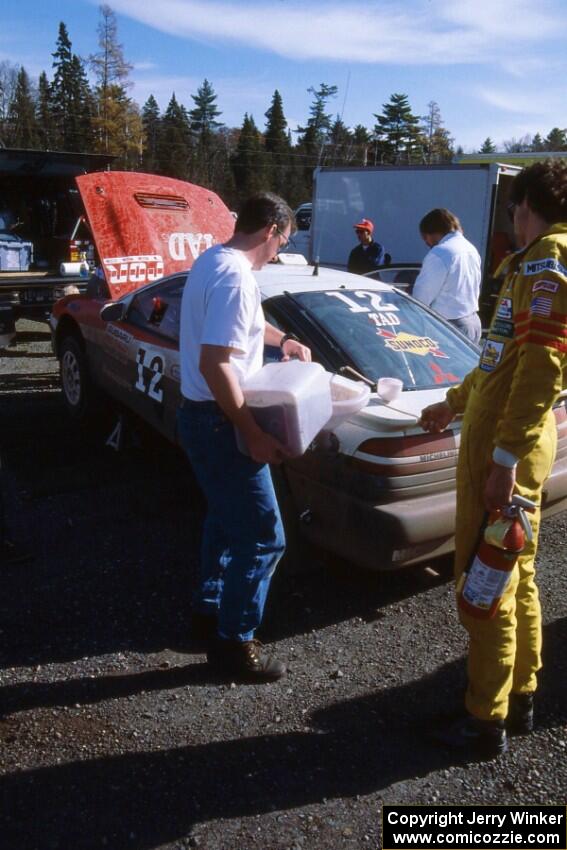 Henry Joy IV / Jimmy Brandt place fuel in their Mitsubishi Eclipse.