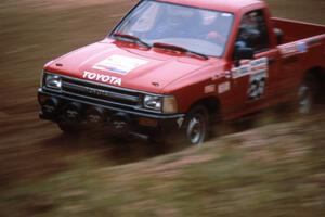 Gary Gooch / Judi Gooch blast past the spectator point on SS1 in their Toyota Pickup.